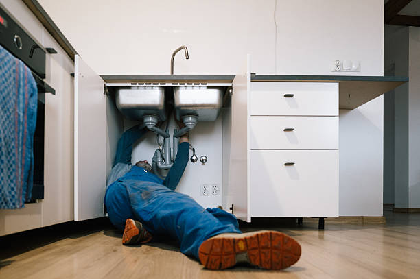 Professional Drain Cleaning technician working in Point Clear, AL
